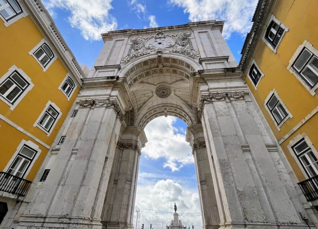 The Rua Augusta Arch leads to Commerce Square and the statue of D. José I