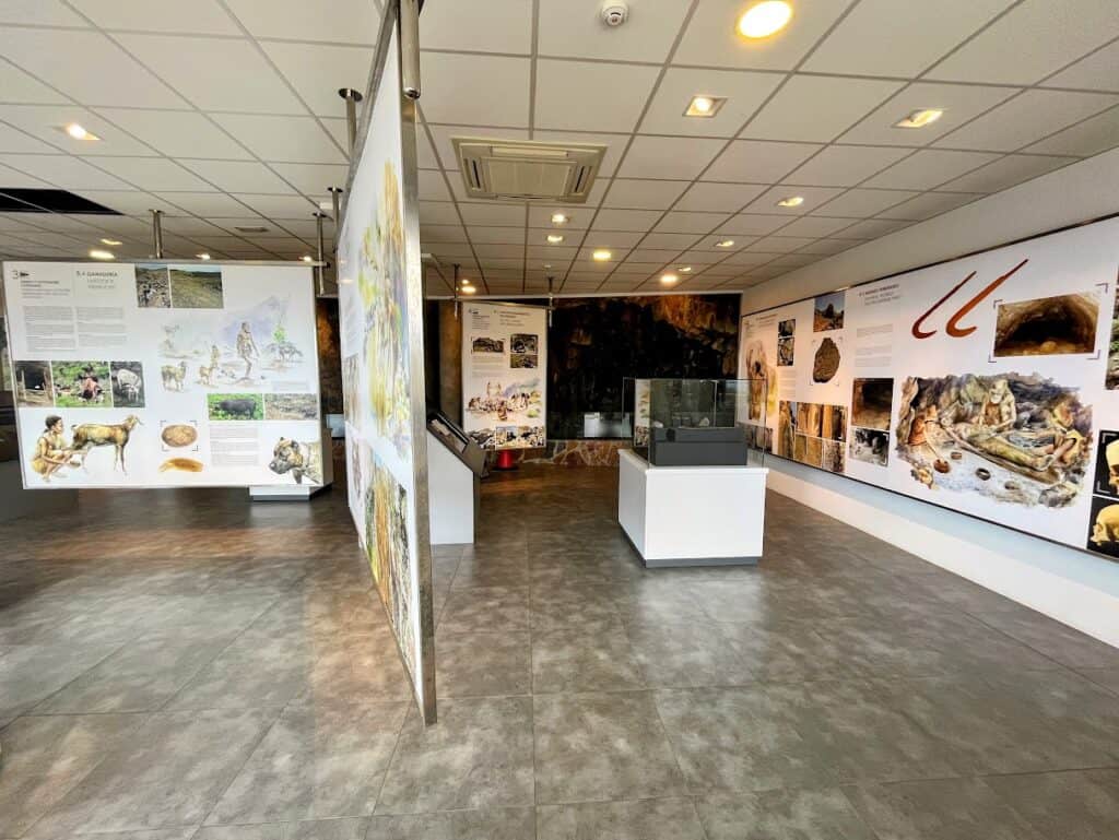 There are many informational signs and artifacts in the El Tendal Exhibit at the archaeological park