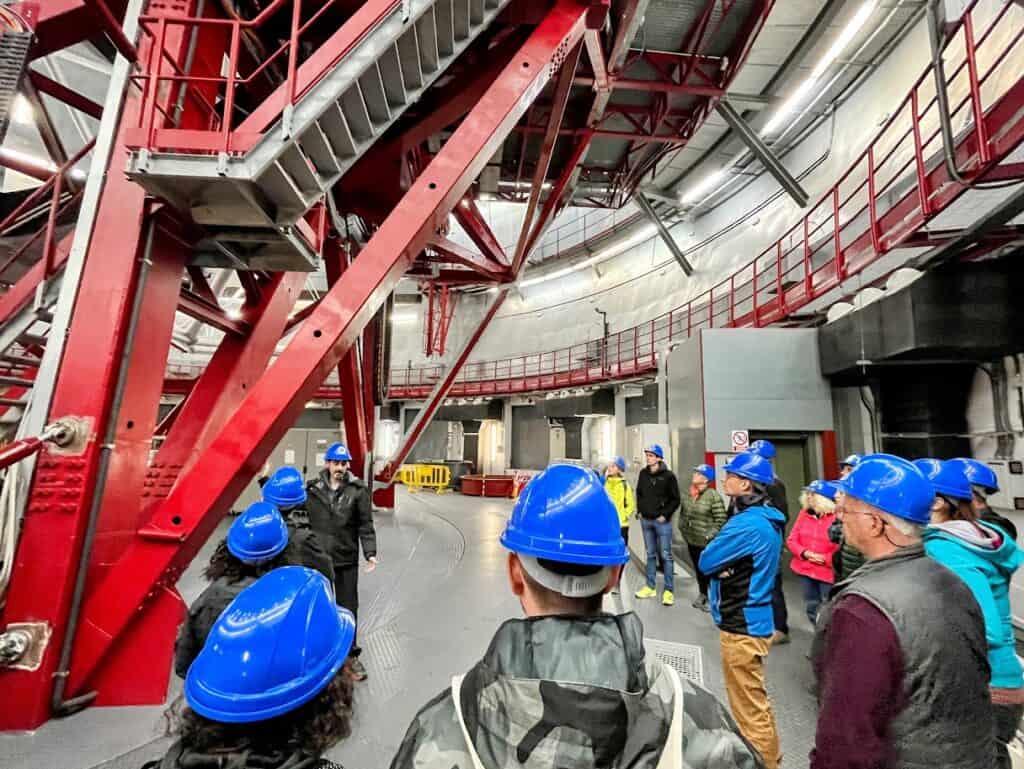 Many visitor with blue hats visit the La Palma Observatory Visitor Centre and Gran Telescopio Canarias