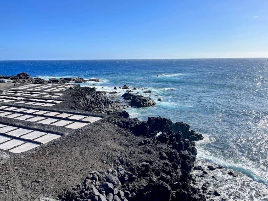 The salt pans of Salinas de Fuencaliente merge with the wild Atlantic coast, a testament to La Palma’s natural and crafted beauty.