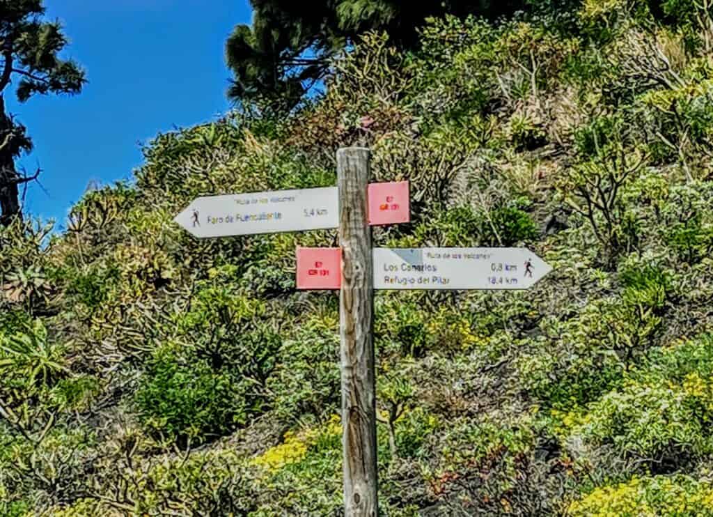 Trail signs with directions and distances at Volcán San Antonio, providing guidance for hikers on the volcanic terrain of La Palma – essential for anyone taking on the Volcán San Antonio hike.