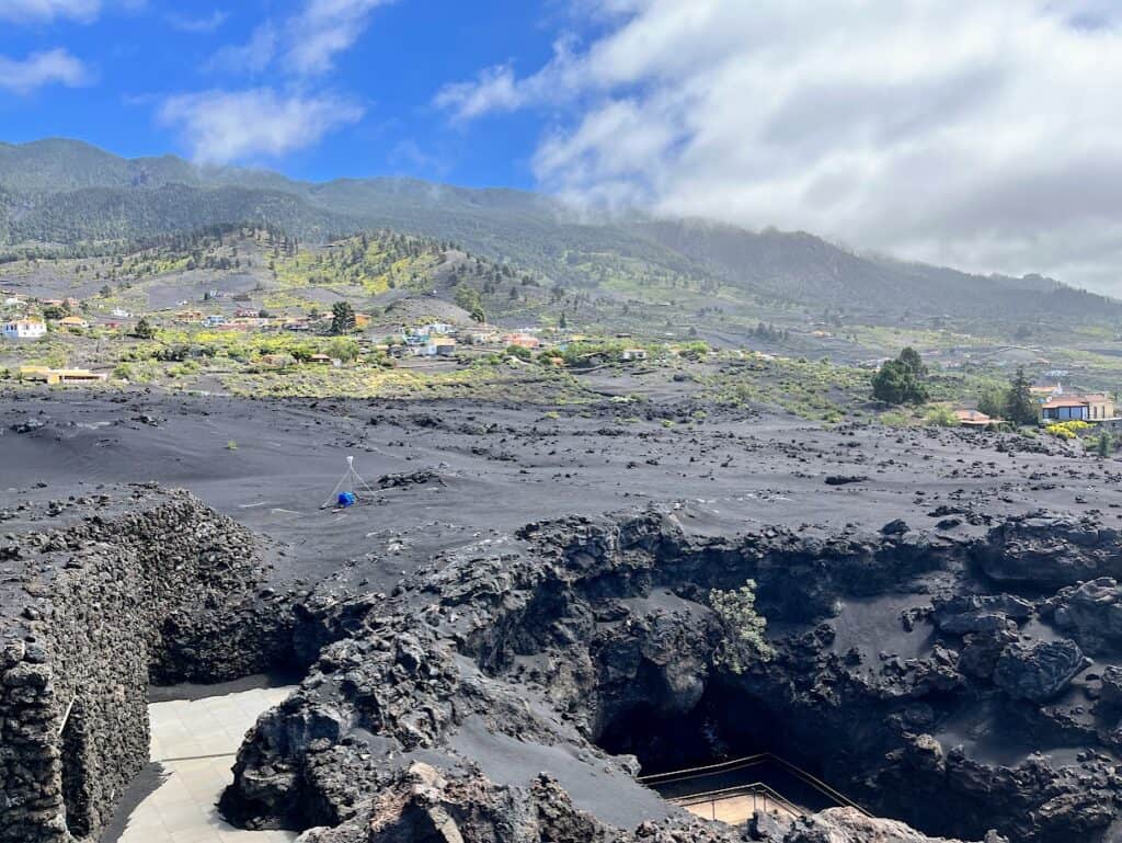 Sweeping views of the volcanic landscape at Caños de Fuego, showcasing the aftermath of volcanic activity on La Palma.