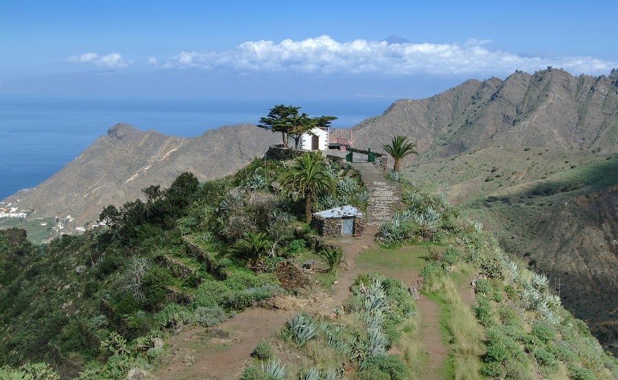 The charming Ermita de San Juan, nestled amidst the greenery, seen by those enjoying the best hiking on La Gomera.