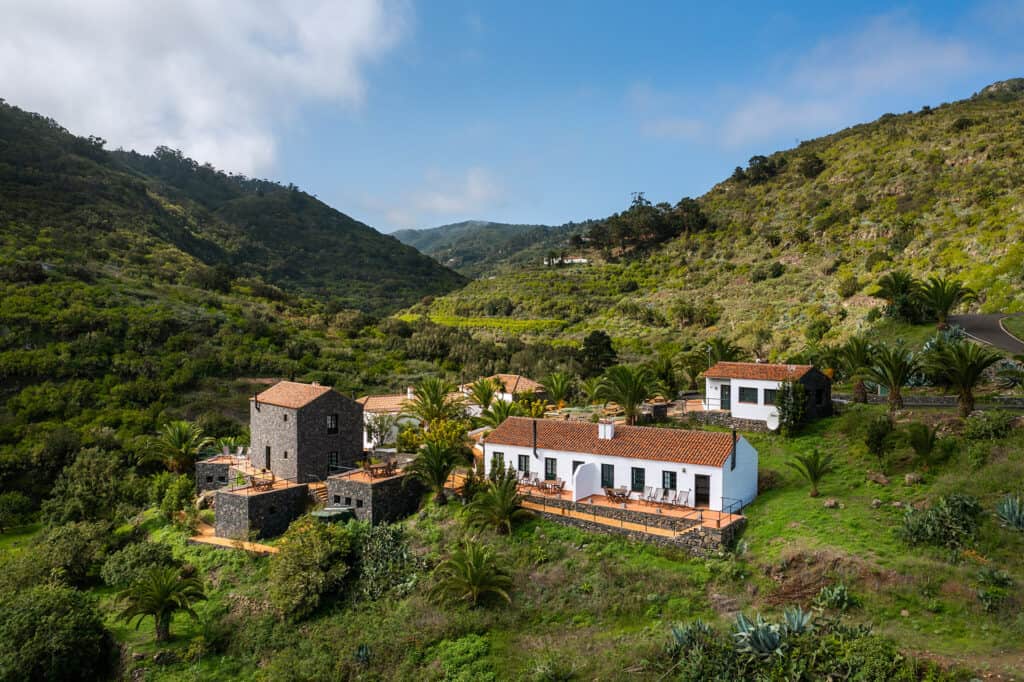 Casa del Chorro in La Gomera, flanked by rich vegetation and the island's rolling hills, offers a tranquil and scenic accommodation for those pondering where to stay neat the Mirador de Abrante.