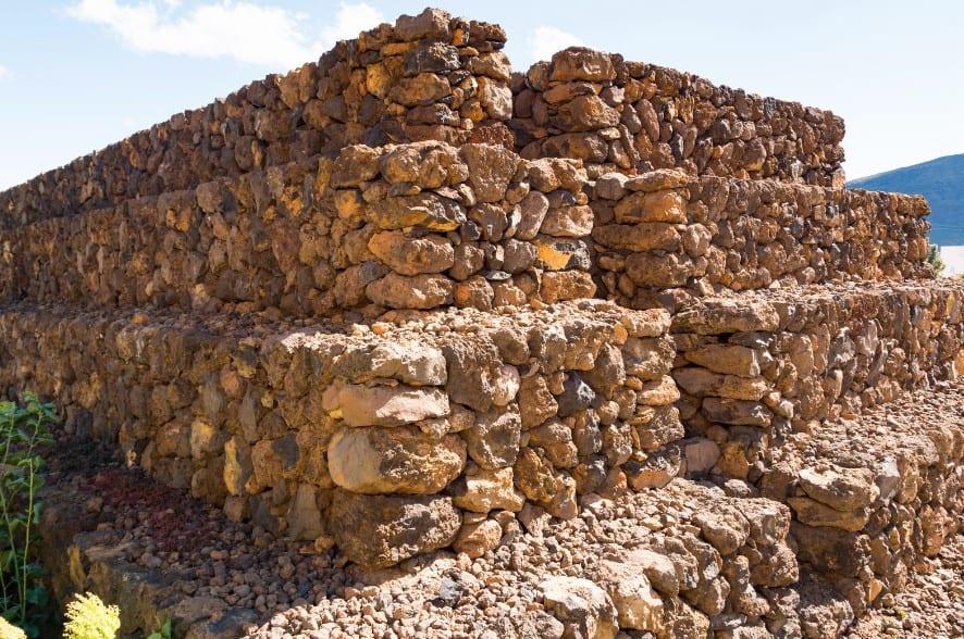 Close-up of the layered stone structures of the Pyramids of Güímar, showcasing archaeological interest among Tenerife theme parks.