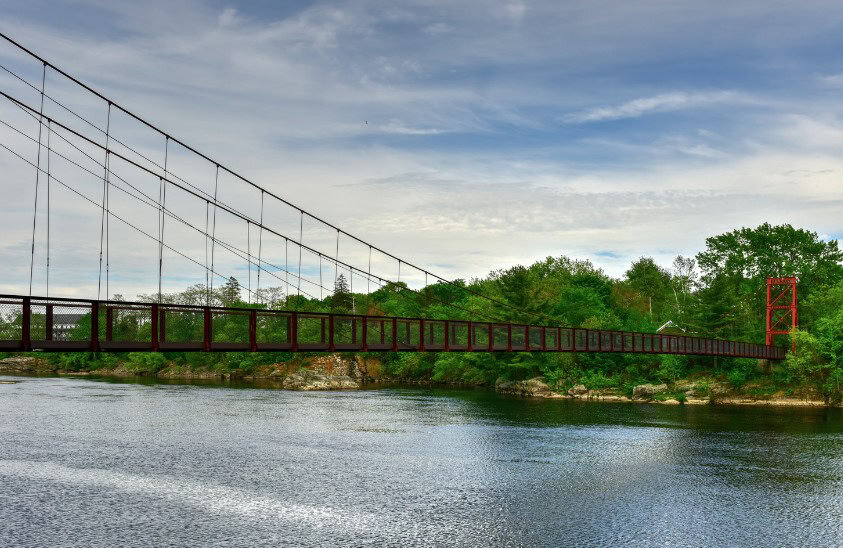 The historic Androscoggin Swinging Bridge in Brunswick, a charming and scenic stop on the trip from Boston to Acadia.