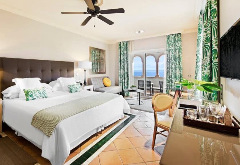 Bright and airy hotel room with ocean view at Bahia del Duque, representing the best hotels in South Tenerife for adults.