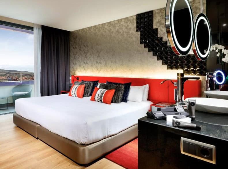 A stylish and modern room at the Hard Rock Hotel, showcasing why it is considered one of the best hotels in South Tenerife for luxury and entertainment.