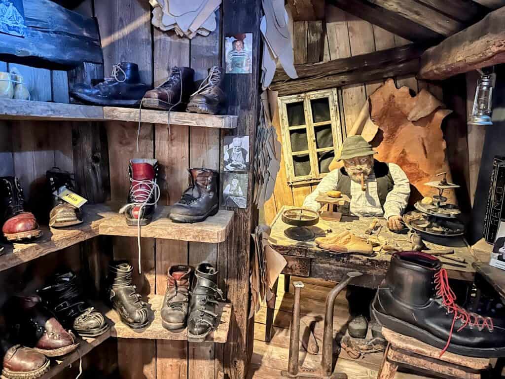 An exhibit at the Matterhorn Museum in Zermatt showcases various artifacts and displays, illustrating the area's rich climbing history. The immersive experience offers insights into the challenges faced by climbers, making it a must-see for those considering how long to spend in Zermatt.