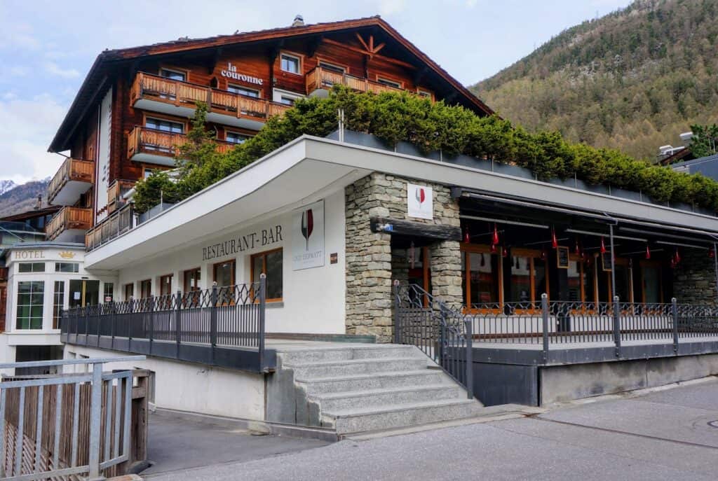 A charming view of Old Zermatt Restaurant, known for its inviting atmosphere and delicious fondue. This restaurant is among the best fondue restaurants in Zermatt, perfect for a cozy dining experience.